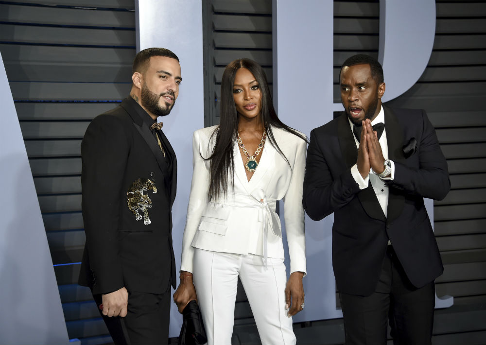 Desde la izquierda, el cantante de hip hop French Montana, la modelo Naomi Campbell y el empresario y músico Sean Combs. (The Associated Press)