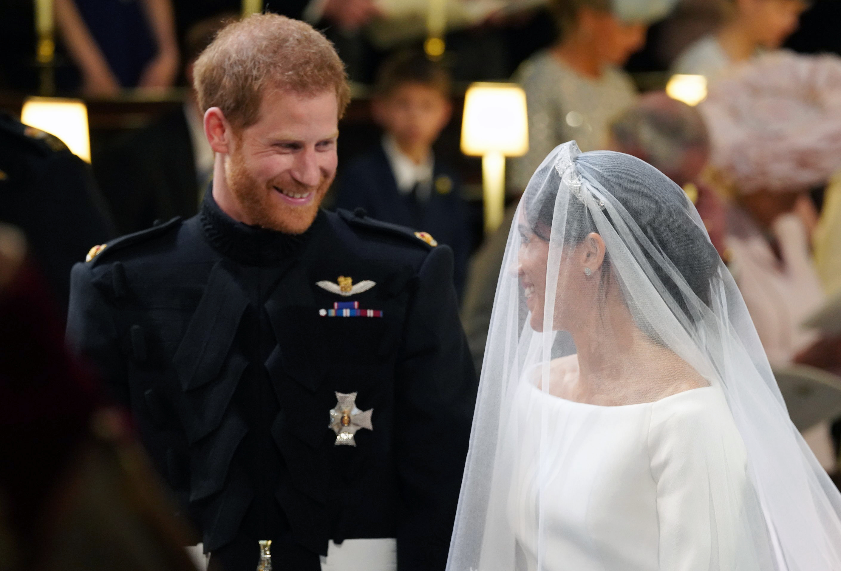 Harry y Meghan tuvieron muchos momentos de complicidad durante la boda que se reflejan en sus gestos y miradas. (Fotos: AP)