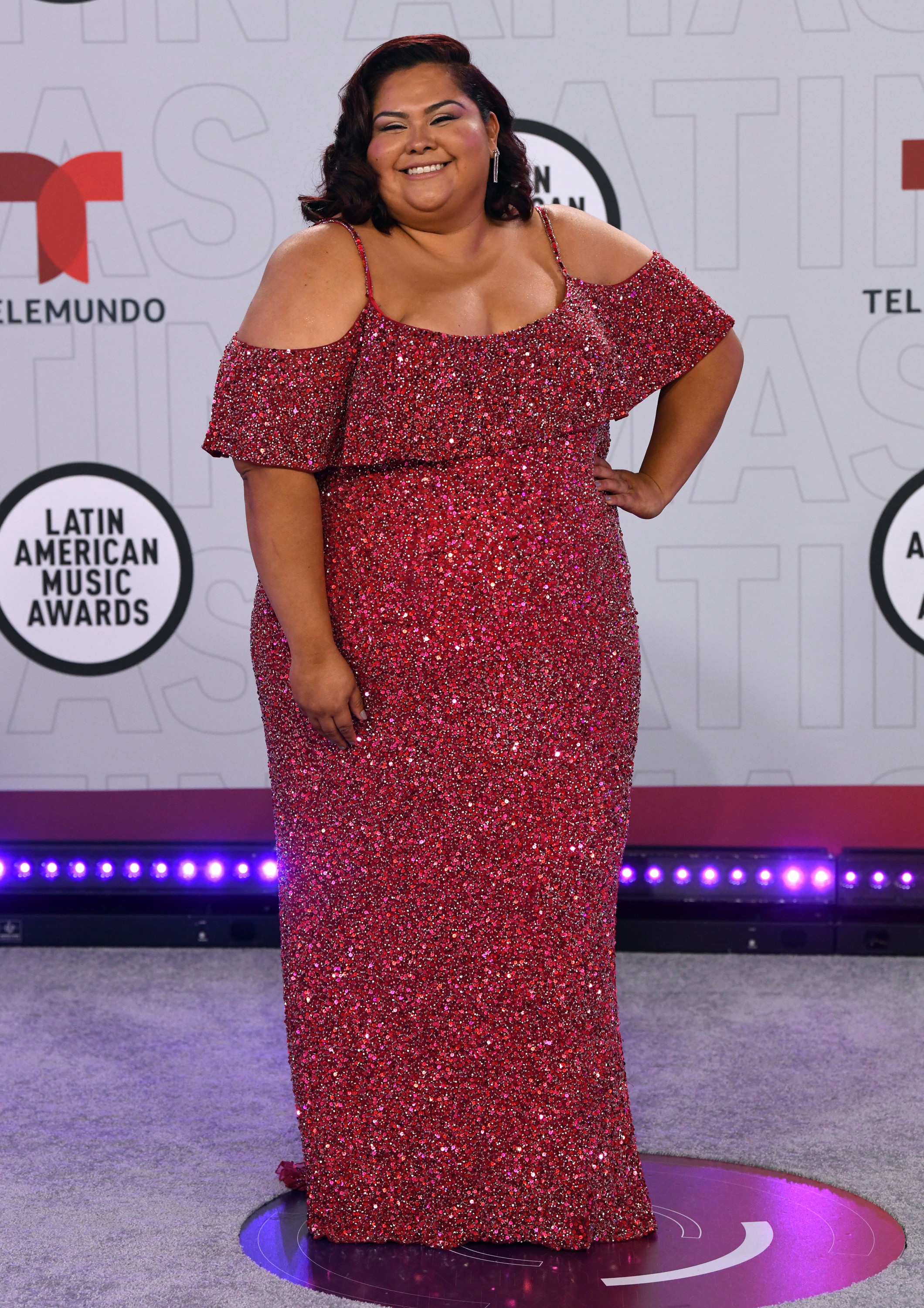 La intérprete de Rox en "La suerte de Loli", Gisella Aboumrad, eligió un vestido de la firma Mac Duggal para la ocasión. (AP)