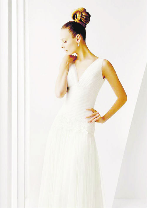 Vestido disponible en D' Royal Bride. Presupuesto: $1,000+ (Suministrada)