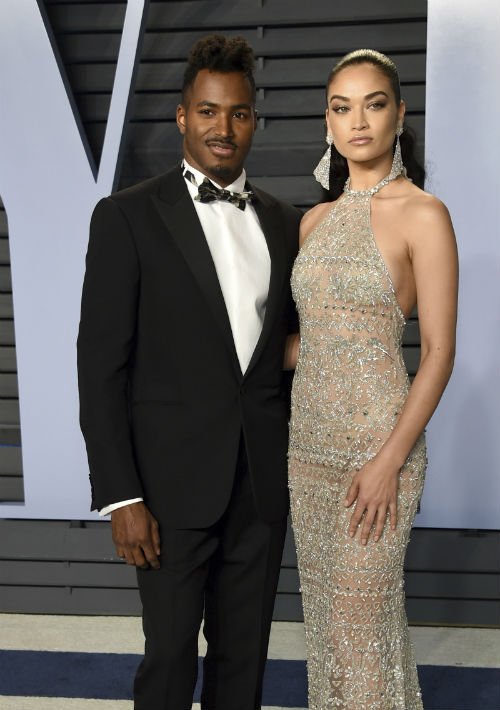 Desde la izquierda, DJ Ruckus y Shanina Shaik. (The Associated Press)
