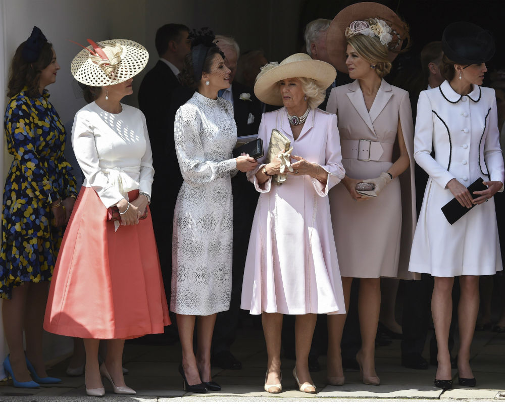 Desde una carpa situada en mitad del recorrido, presenciaron el paso de la comitiva las reinas Letizia y Máxima de Holanda, la duquesa de Cambridge, Kate Middleton; y la duquesa de Cornualles, Camilla. (EFE)
