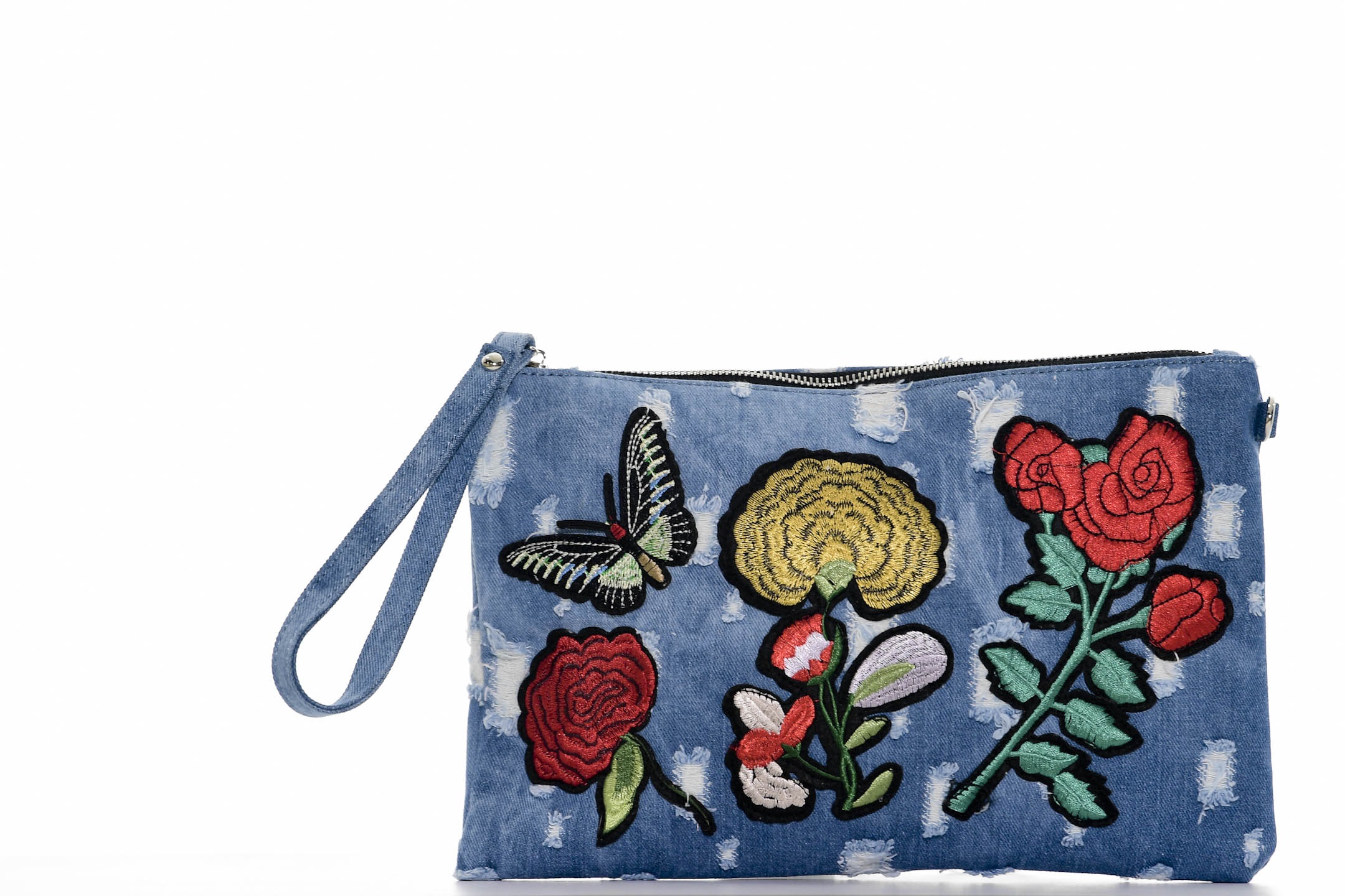 Bolso con calcomanías, de Galería. (André Kang)