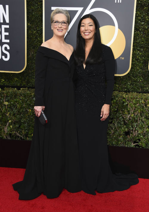 Meryl Streep y Ai-jen Poo. (Photo by Jordan Strauss/Invision/AP)