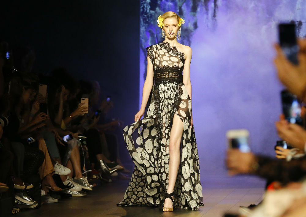 Naeem Khan (AP)