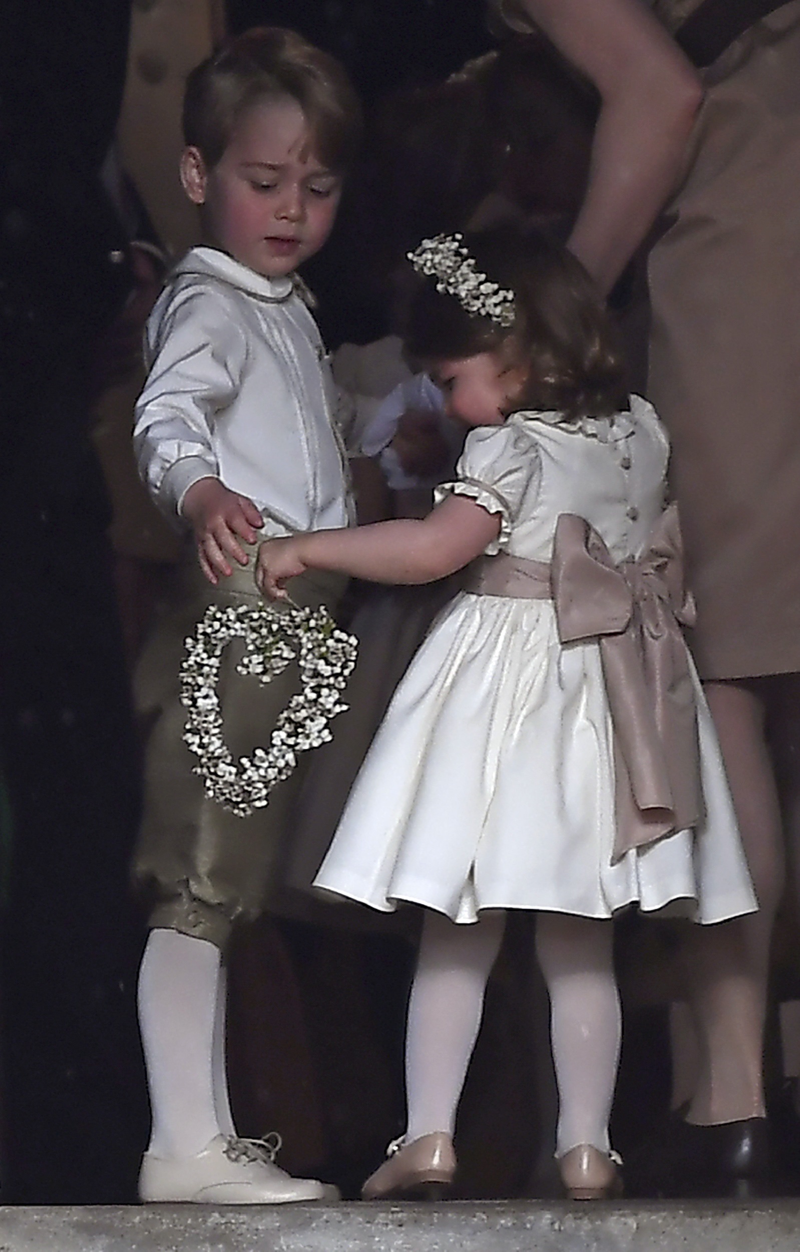 Los hijos de la duquesa de Cambridge y el príncipe Guillermo, Carlota y Jorge. (Justin Tallis/Pool via AP)